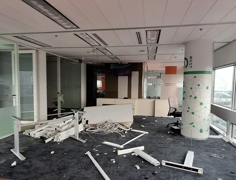 Office partitions and fittings being stripped out during a Singapore reinstatement